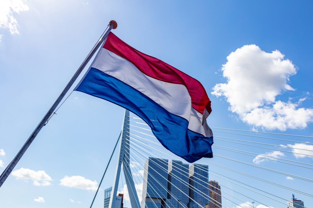 Dutch national flag waving on a boat in Rotterdam