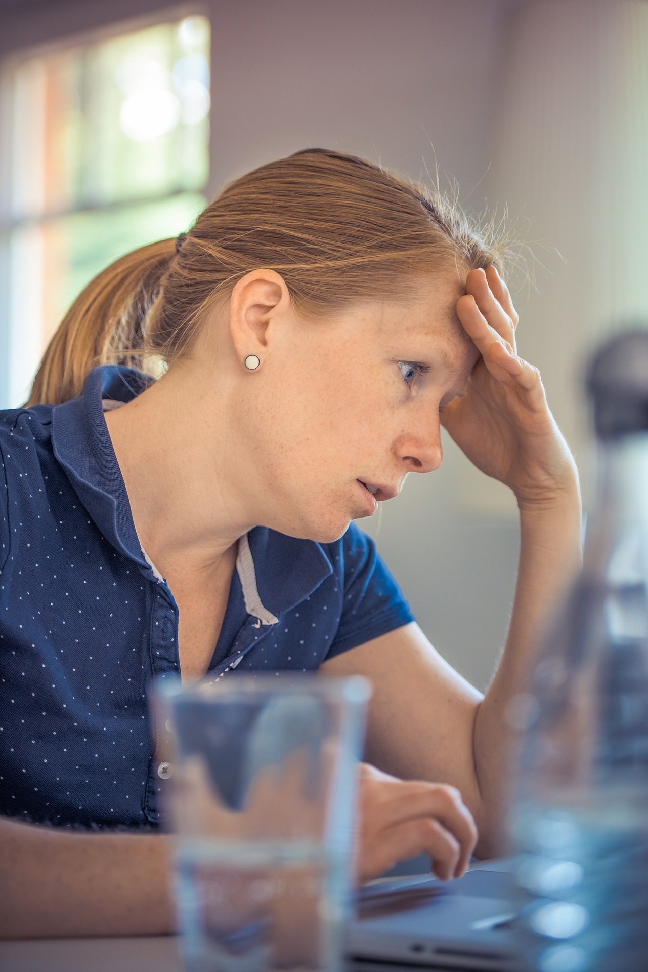 woman stressed at her computer